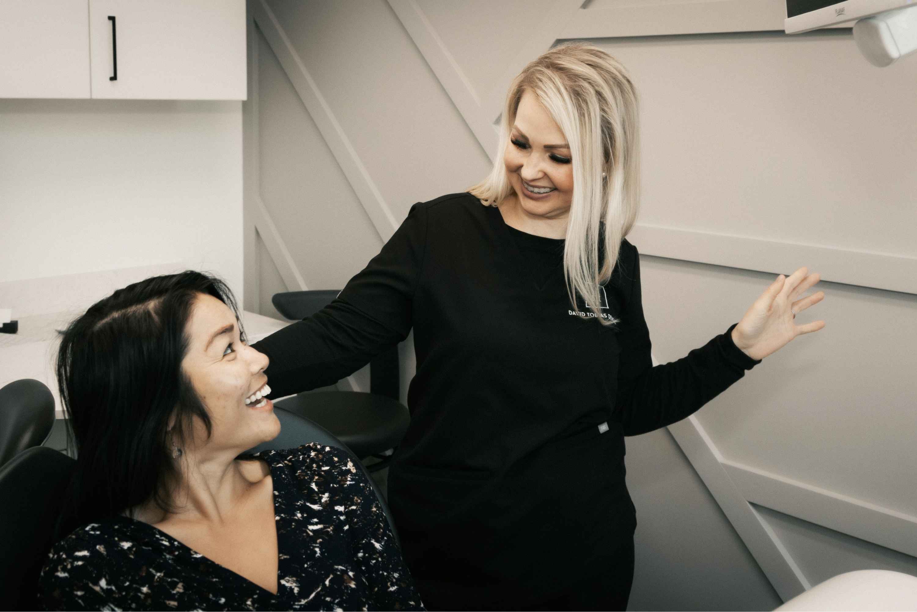 Your first visit to The Dental Atelier — hygienist with patient